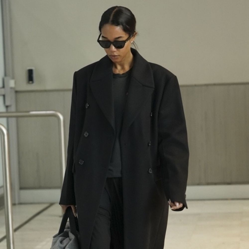 Laura Harrier's Airport Trouser-and-Shoe Formula Looks Much More Elevated Than Jeans and Trainers