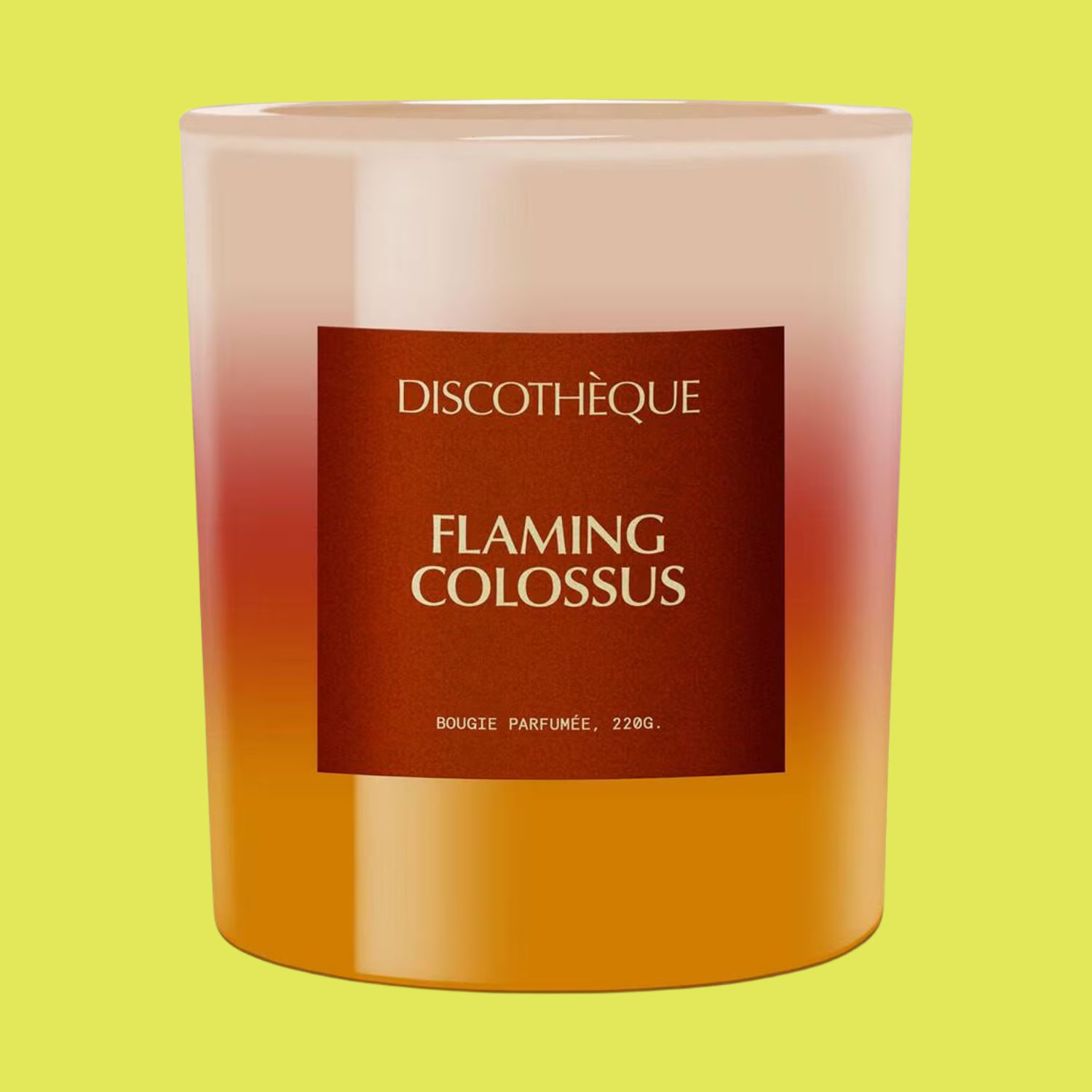 An orange, red, and pink glass candle