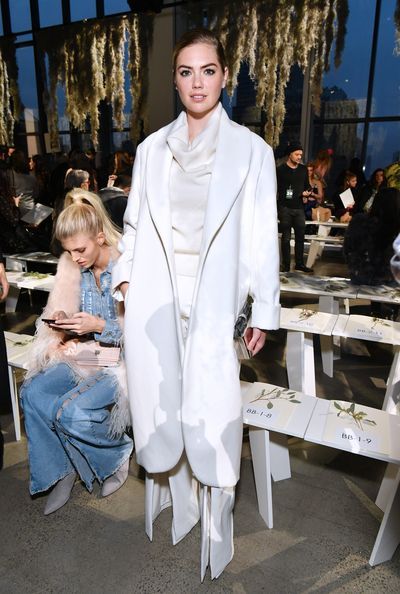 White, Clothing, Fashion, Fashion design, Uniform, Outerwear, Suit, Coat, Street fashion, Formal wear,