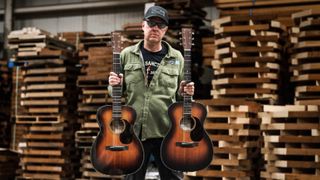 Joe Bonamassa poses with the two Martin 00-18 Joe Bonamassa signature model acoustics