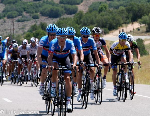 Garmin-Sharp's Nathan Haas sets tempo at the front of the bunch for his team leader Christian Vande Velde