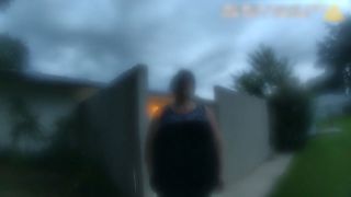 police body camera footage of a woman standing outside her home and fence in the documentary the perfect neighbor