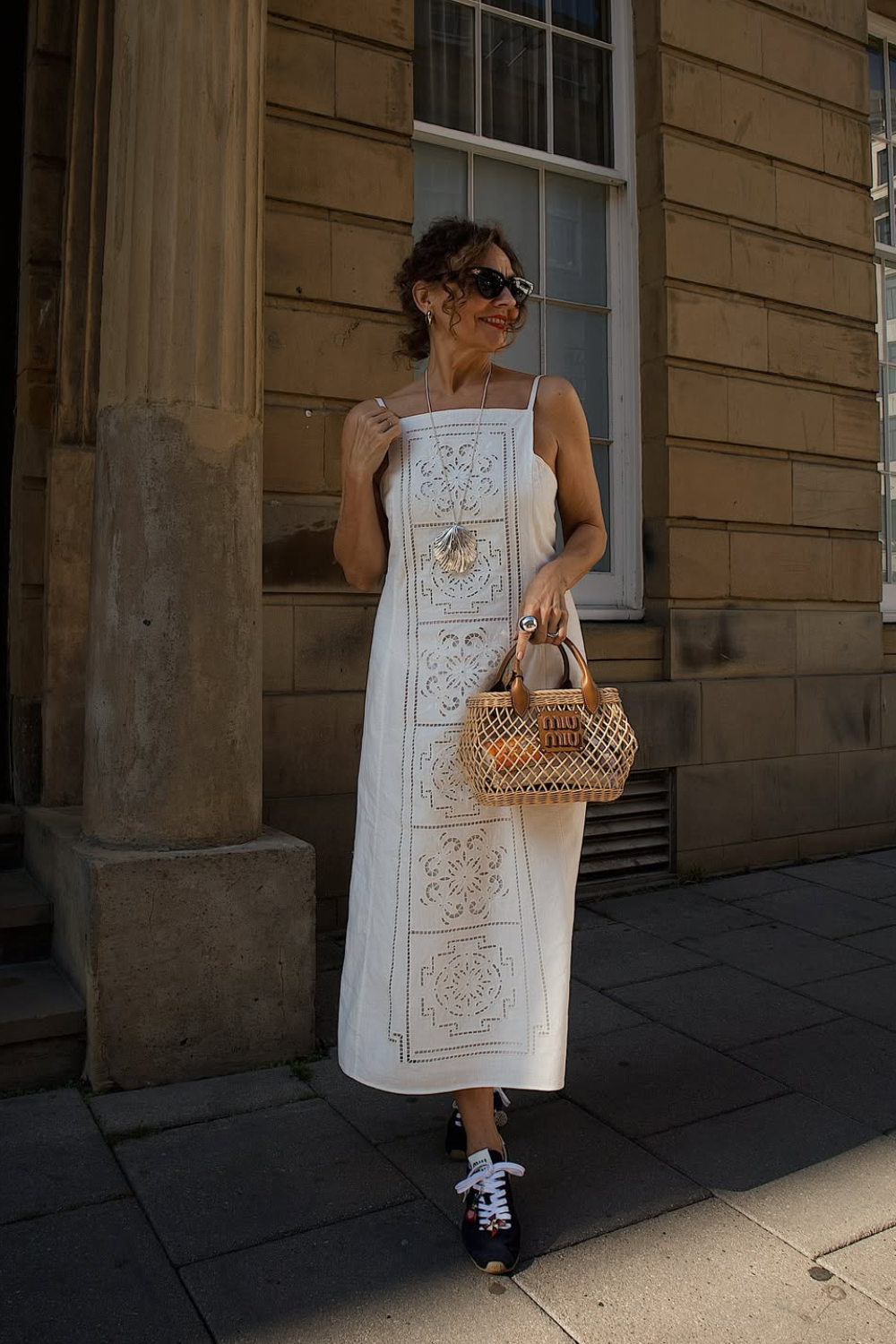 @venswifestyle wears white dress and Miu Miu trainers