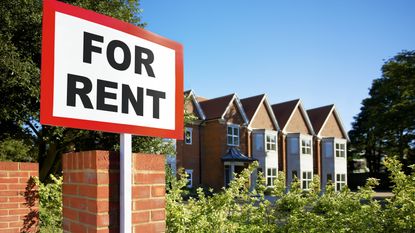 for rent sign in front of property