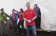 The six-person crew of the one-year HI-SEAS mock Mars mission emerges from a habitat on Mauna Loa in Hawaii on Aug. 28, 2016. It marked the fourth and longest expedition by the Hawaii Space Exploration Analog and Simulation.