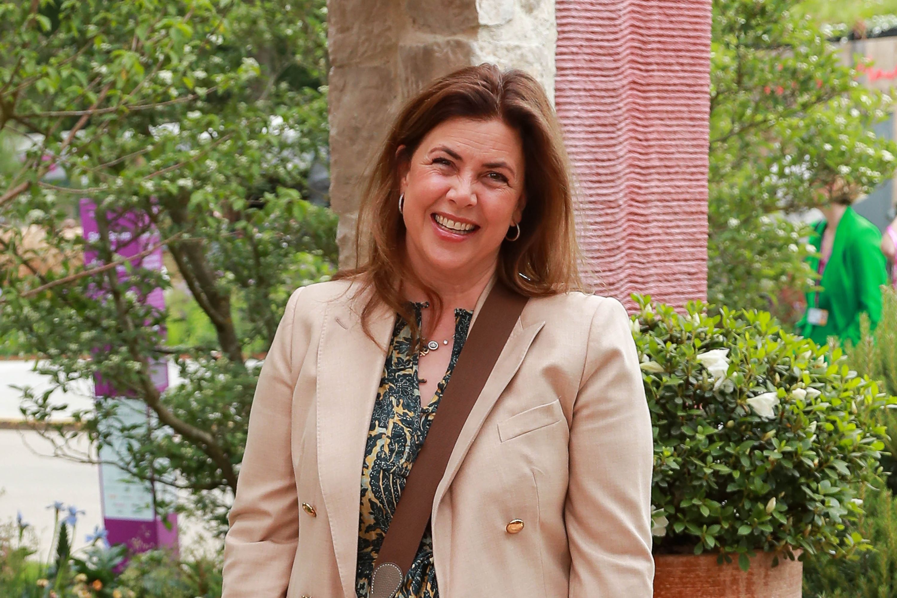 Kirsty Allsopp in a beige blazer and printed dress