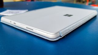 Surface Go 3 on a blue table outdoors