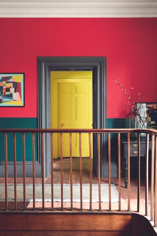 Painted door in hallway by Little Greene