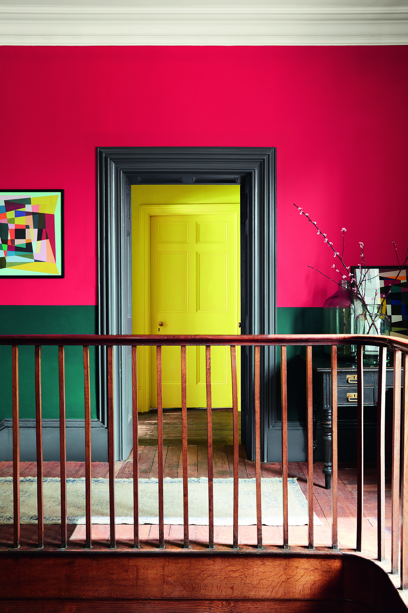 Painted door in hallway by Little Greene