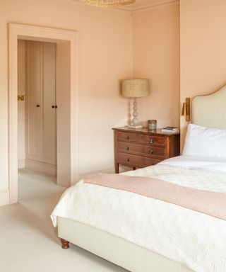Pink bedroom painted in Farrow & Ball Setting Plaster
