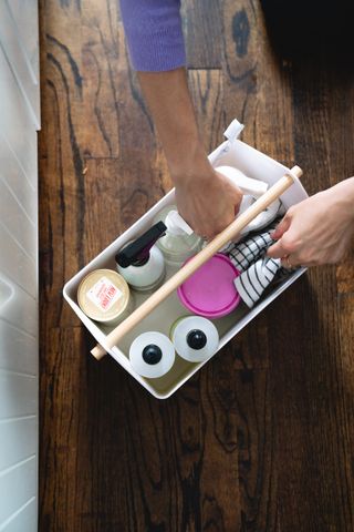 bathroom cleaning caddy with products
