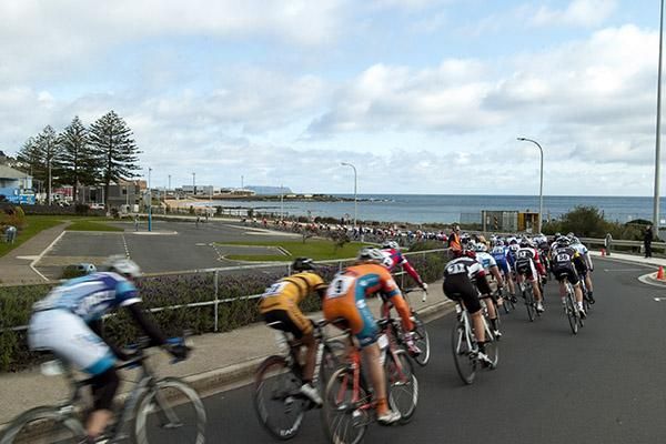 The peloton speed along the Burnie foreshore during stage five of the tour.