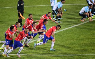 Chile players celebrate victory on penalties against Argentina in the final of the Copa America in 2015.