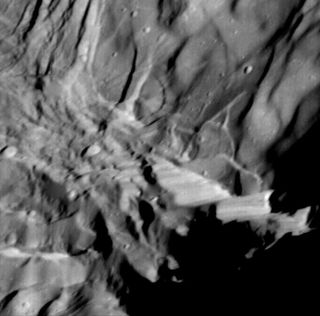 Verona Rupes, about 50km long and several km high, but not actually so cliff-like as it appears as seen by Voyager 2 during its 1986 flyby.