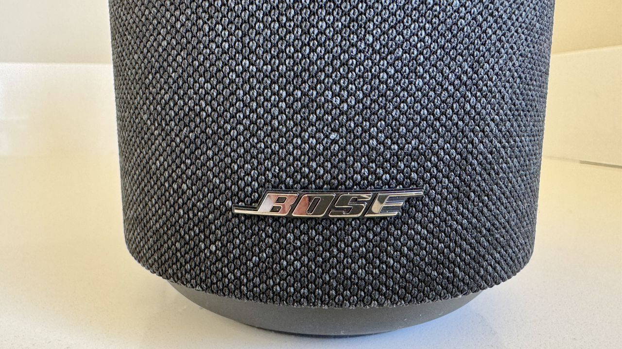 Bose Lifestyle Ultra speaker on a white table