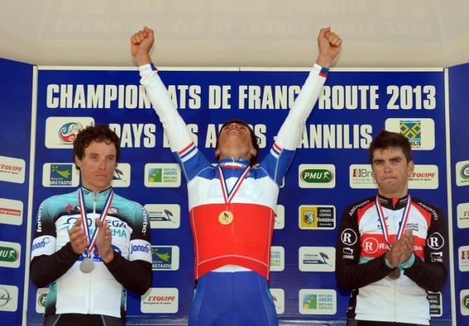 Sylvain Chavanel and Tony Gallopin applaud as Arthur Vichot celebrates his win