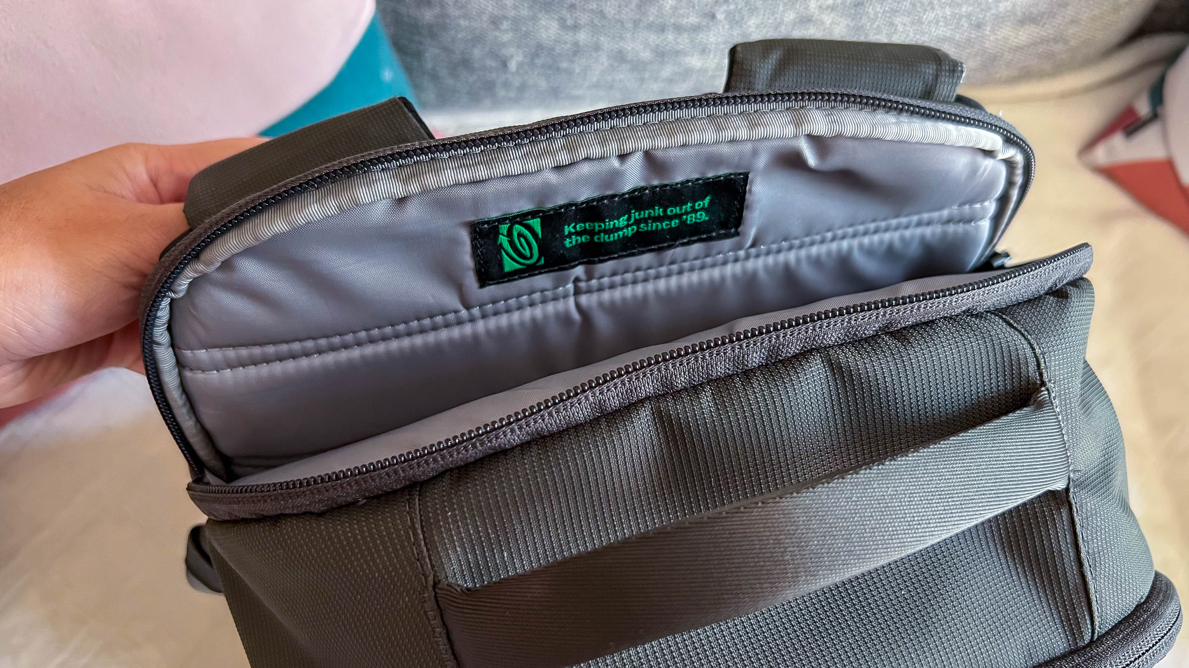 Timbuk2 Division Laptop Backpack Deluxe on the reviewer's couch