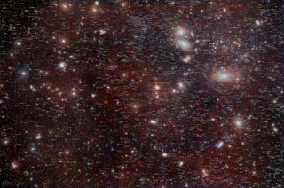deep sky image of galaxies showing numerous galaxies and stars. the image also has labels of the official galaxy names