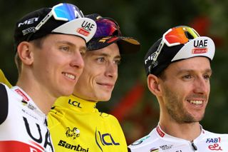 The 2023 Tour de France podium (l-r): Tadej Pogacar, Jonas Vingegaard and Adam Yates