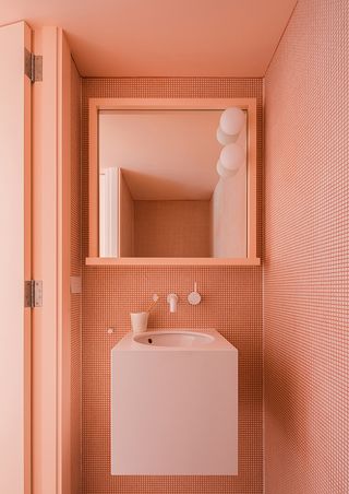 Playful block colour bathroom tiling