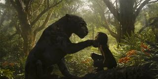 Mowgli and Bagheera sitting in the jungle in Mowgli Legend of the Jungle