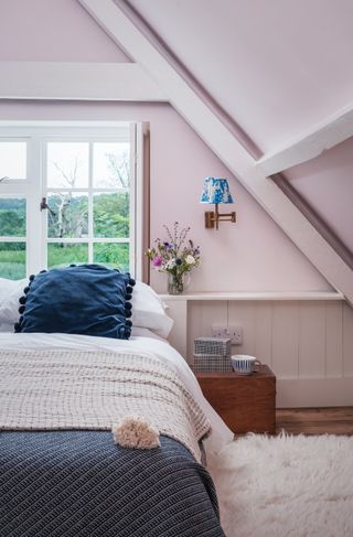 pink master bedroom in a cottage in Kent