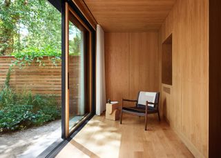 timber clad interior of extension atBed-Stuy Townhouse