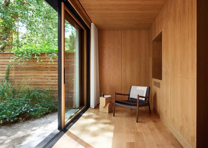 timber clad interior of extension at Bed-Stuy Townhouse
