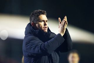 Marc Skinner, Manager of Manchester United, applauds the fans after the draw during the Barclays Women's Super League match between Brighton & Hove Albion and Manchester United at Broadfield Stadium on November 05, 2023 in Crawley, England.