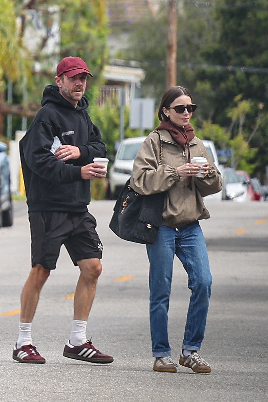 Lily Collins wore her cigarette jeans outfit with Adidas sneakers on April 13