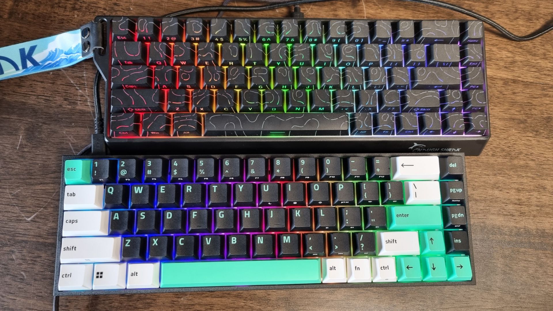 A Gamakay x NaughShark NS68 above a Razer Reclusa X Mini 65% gaming keyboard