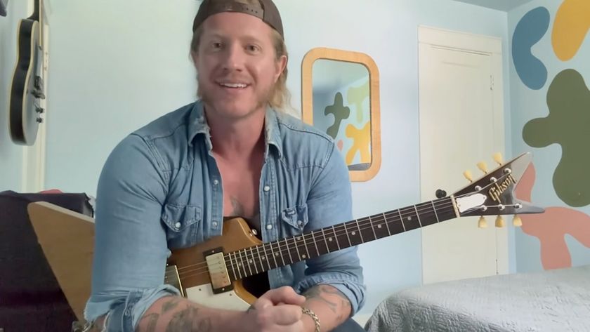 Jared James Nichols poses with a Gibson Explorer/Flying V