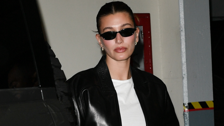 Hailey Bieber wearing sunglasses and a white tshirt