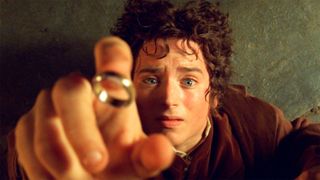 Elijah Wood as Frodo Baggins catching the One Ring on his finger