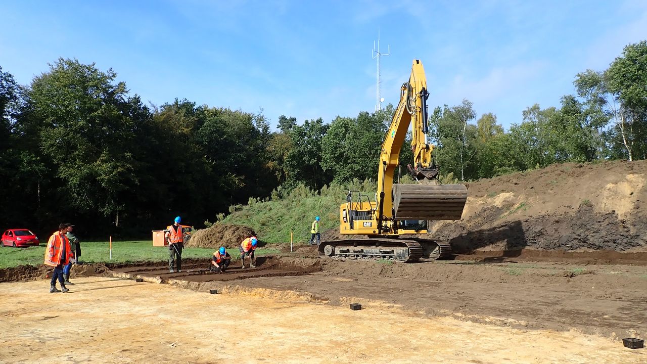 A photo of a bulldozer at an excavation site