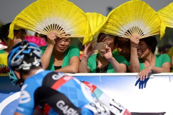 The Chinese fans make their own sunshine at the Tour of Beijing