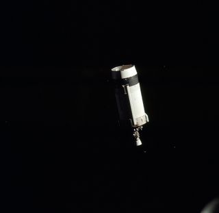Saturn IVB stage against the black backdrop of space.
