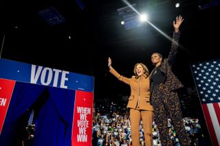 Kamala Harris and Michelle Obama campaign together in Michigan wearing coordinating suits