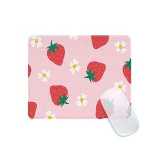 A pink strawberry and daisy patterned mousepad