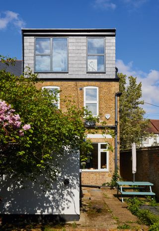 December 2019: Katy Waters and husband Jason have created a Scandi-inspired master bedroom in the loft of their home in Ealing