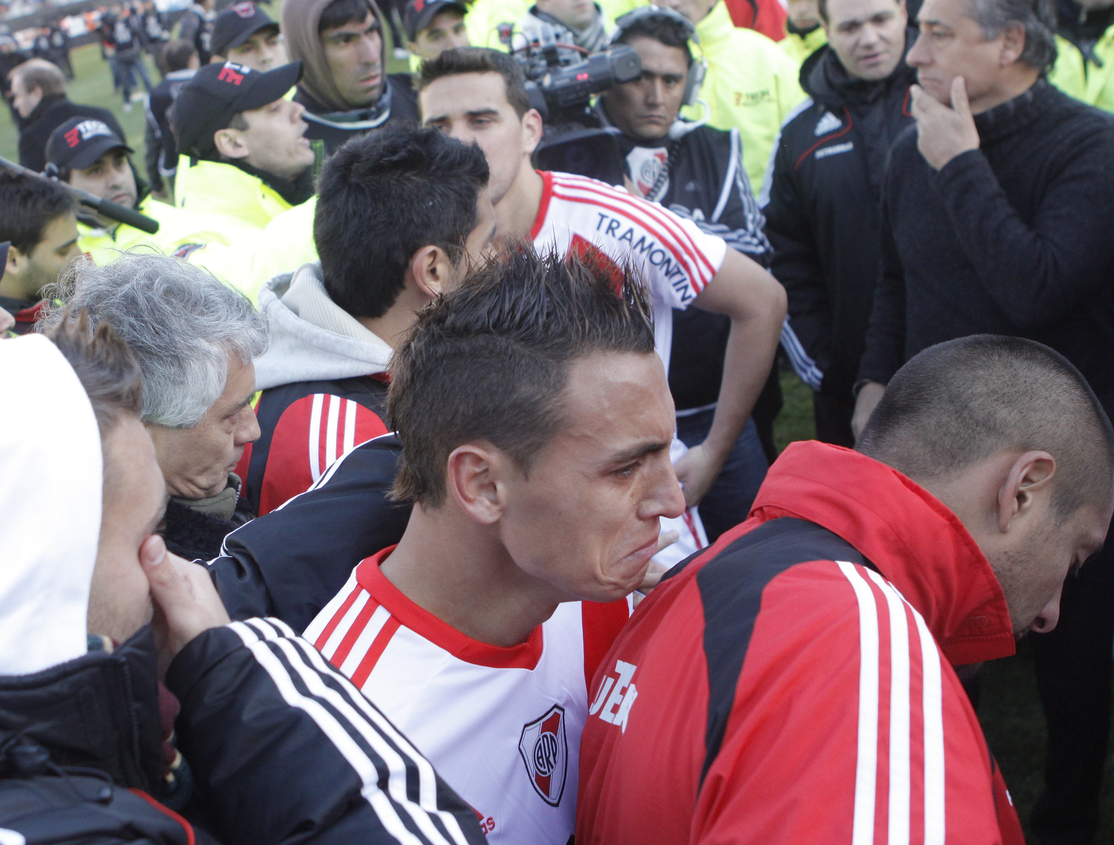 River Plate players in tears after relegation is confirmed following a game against Belgrano de Cordoba in June 2011.