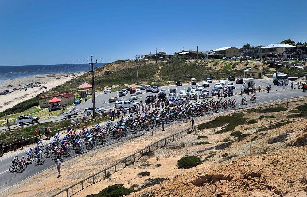 The peloton rides along the coast during stage 5 at the Tour Down Under.