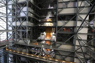 The SLS rocket and Orion spacecraft for NASA's Artemis 1 mission as seen inside the Vehicle Assembly Building at Kennedy Space Center in Florida on Dec. 13, 2021.