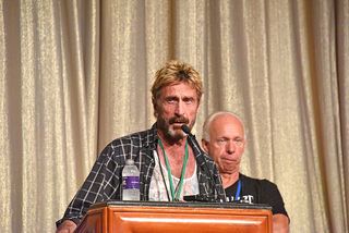 John McAfee speaking at an event