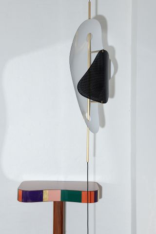 Colourful console table and a standing lamp