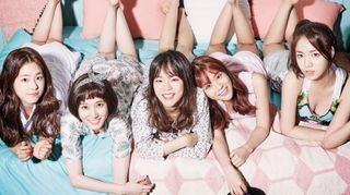 five women lying down and smiling in promo image for hello my twenties