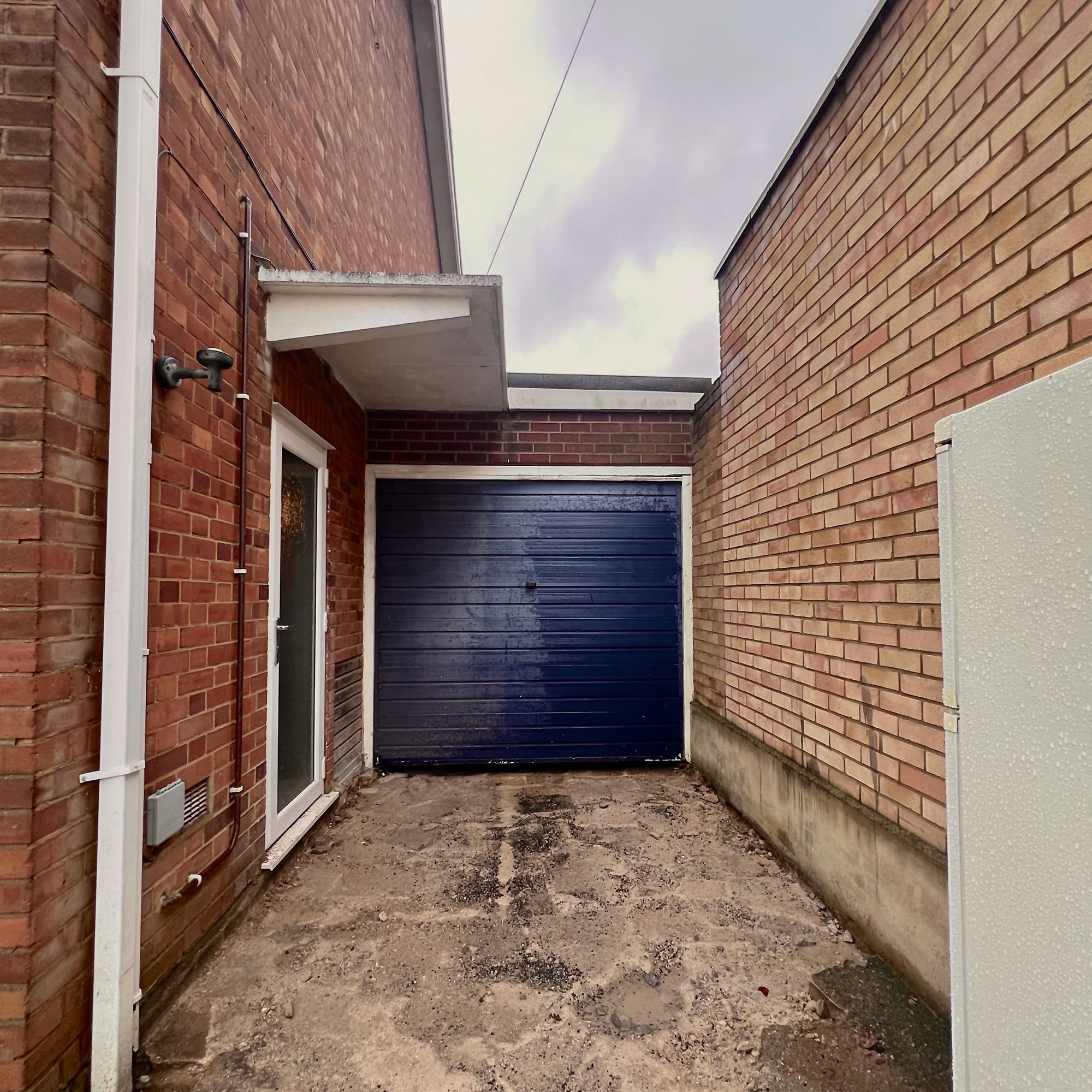 Garage and exterior walls of house