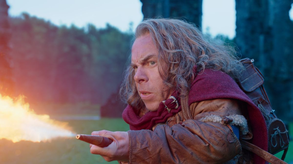 Warwick Davis&#039; Nelwyn sorcerer Willow Ufgood shoots flames in the upcoming Willow sequel series.