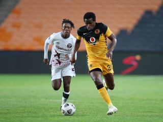 Willard Katsande of Kaizer Chiefs challenged by Kgaogelo Sekgota of Swallows FC