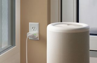 Eve Energy smart plug installed in an outlet